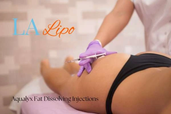 Woman having fat dissolving injections Small Heath on thighs