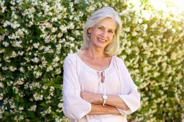 Older woman happy with urinary incontinence treatment Small Heath