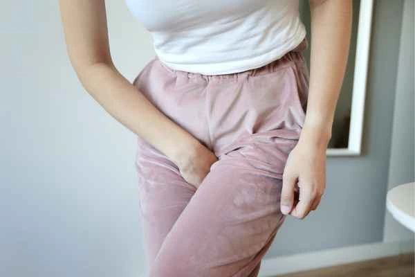 older woman running to the toilet because of urinary incontinence Small Heath